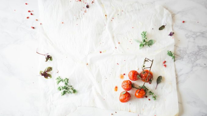 closeup photo of fruits on white surface