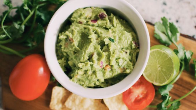green soup in white ceramic bowl