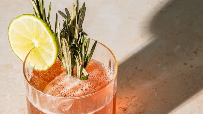 clear drinking glass with orange juice