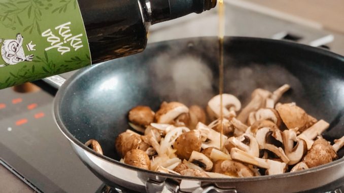 brown and black mushroom on black frying pan