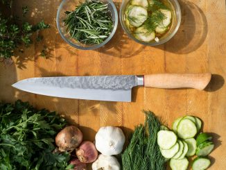 sliced vegetables and meat on chopping board