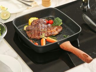 cooked meat on black rectangular tray