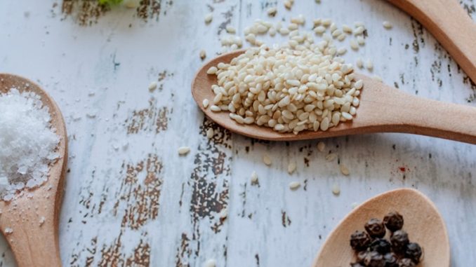brown wooden spoon with brown powder