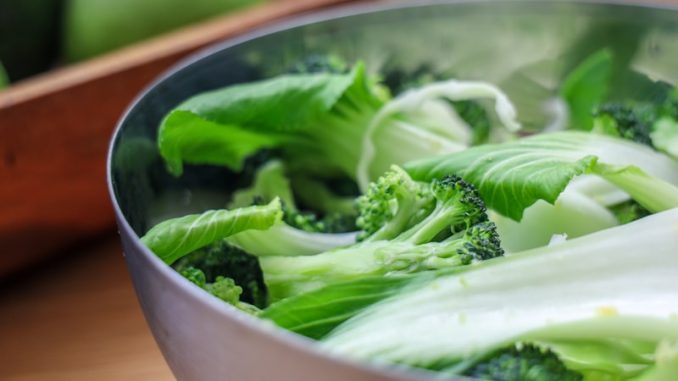 green vegetable on stainless steel bowl